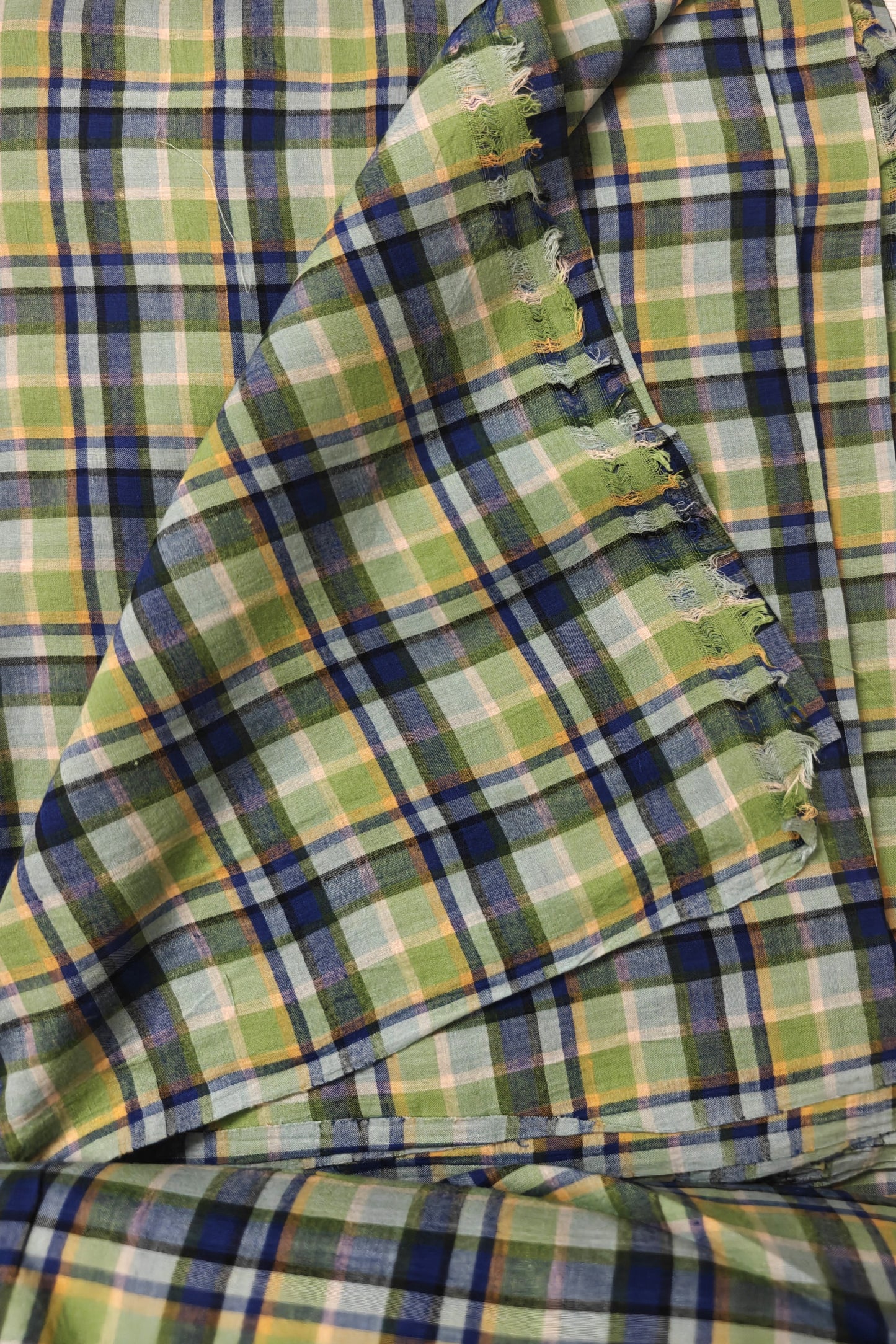 Handwoven green and blue plaid cotton fabric – breathable, lightweight, and sold by the meter.