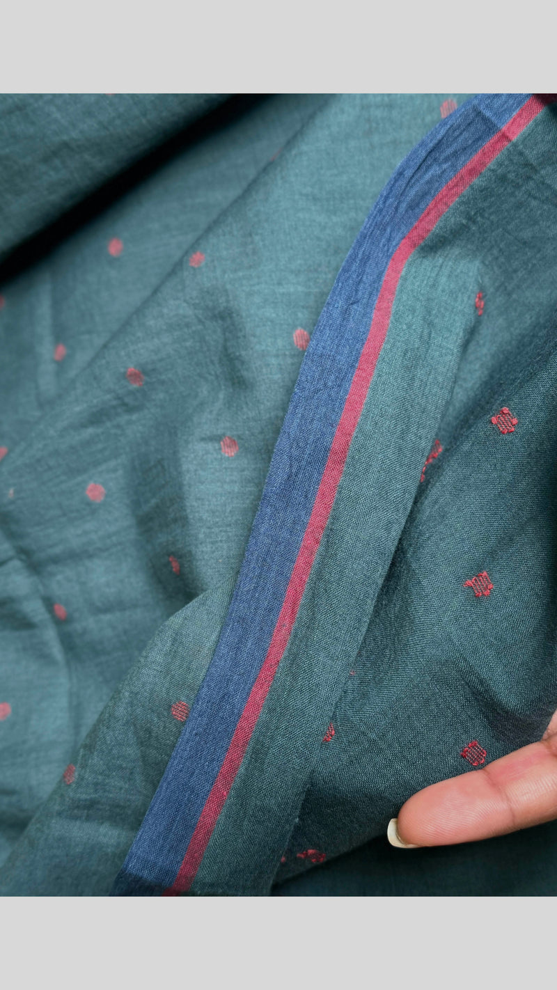 Green & Red Dotted Cotton Jamdani Saree by VarsaaEdit – sustainable handloom weave reflecting Bengal heritage.