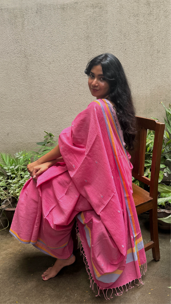 Bright pink handloom cotton Jamdani saree with striped pallu – traditional weave