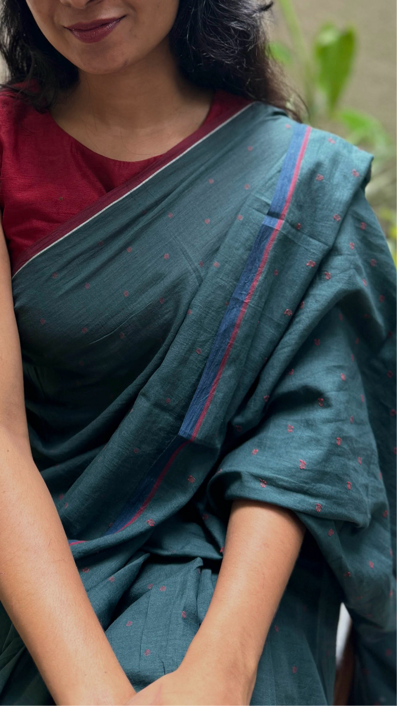 Handwoven Cotton Jamdani Saree in Green with Red Dots – VarsaaEdit’s artisanal Bengal craftsmanship.
