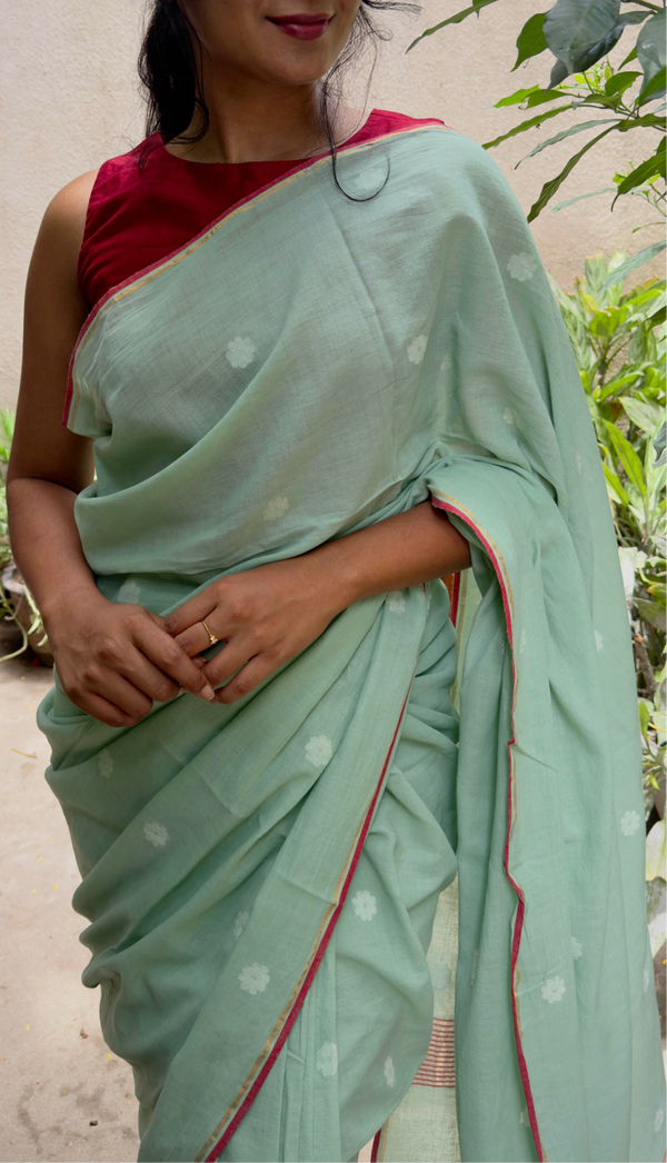 Elegant pastel green Jamdani saree – handcrafted cotton with floral details
