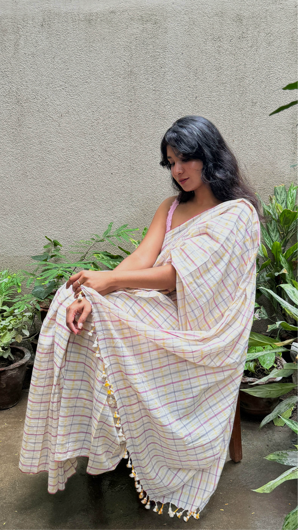 Woman wearing VarsaaEdit multi-coloured Checks Khadi Cotton Saree – handwoven Bengal handloom drape with elegant traditional design