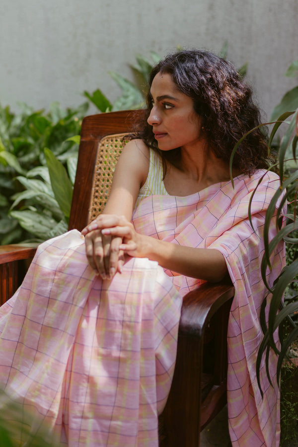 peach and yellow checked handloom cotton saree with soft pastel hues
