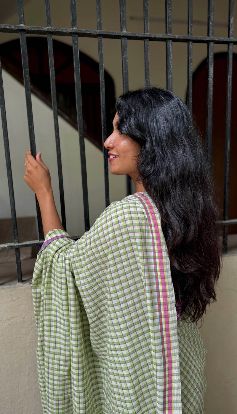 VarsaaEdit Light Green & Purple Checked Handloom Cotton Saree – artisanal craftsmanship blending heritage and contemporary style.
