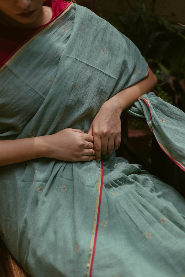 Traditional Bengali Green Jamdani Saree with red border detailing